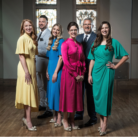 Collingsworth family pose for a photo in church vestibule