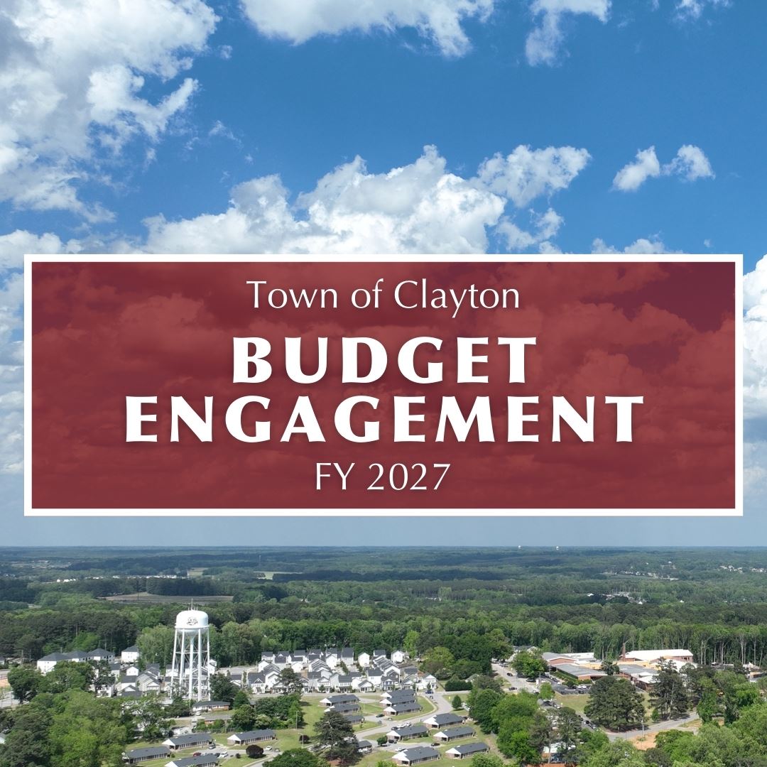Budget Graphic that reads 'Town of Clayton Budget Engagement FY27' overlaying aerial view of C